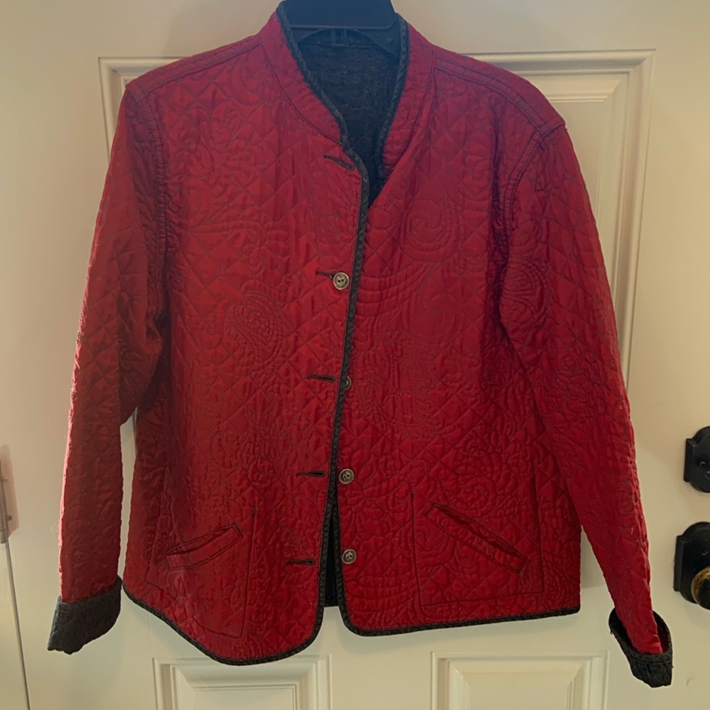 Reverse-able Chicos quilted jean jacket. Black jean and red. Size 2.